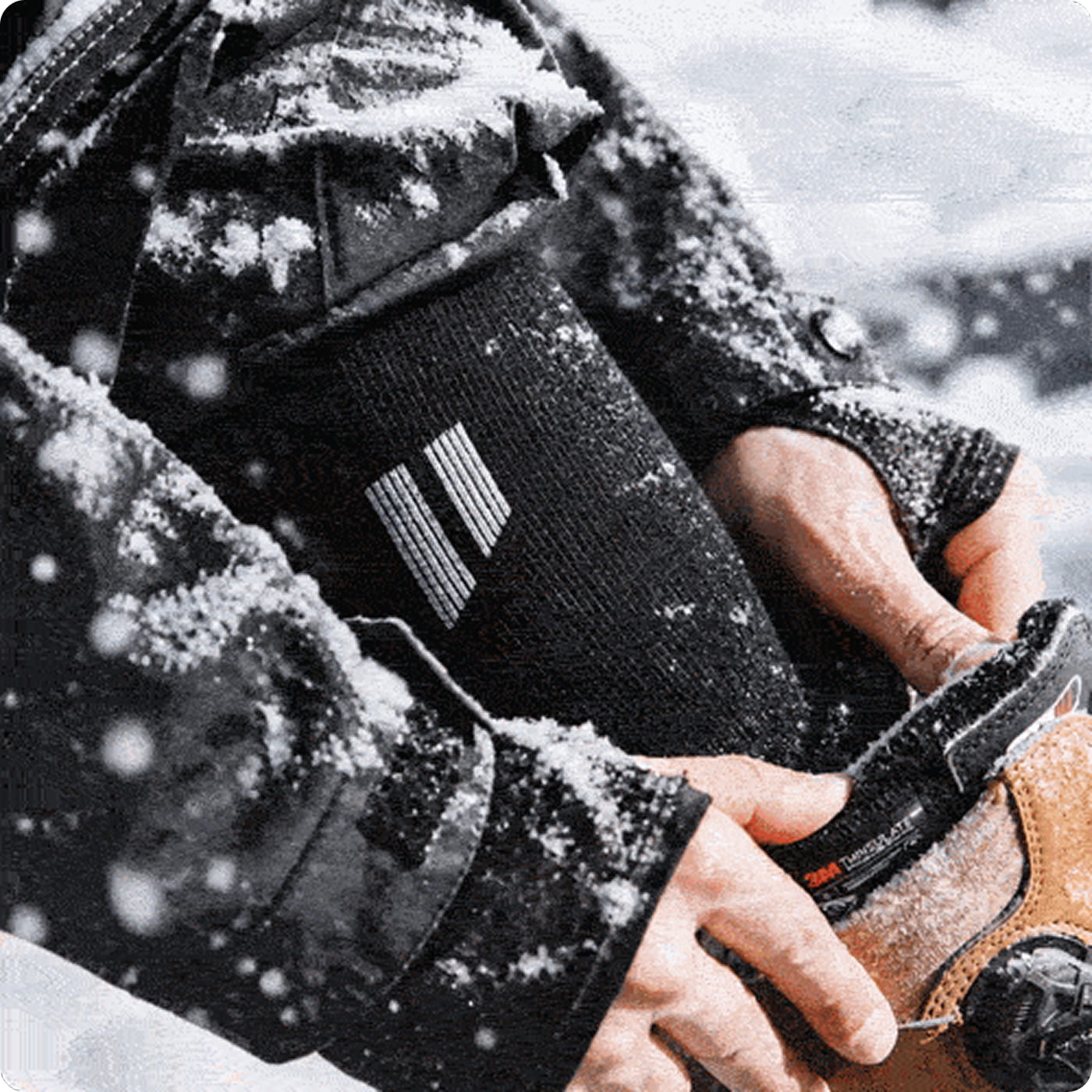 Picture of Ski/snow Socks in a boot with snow around.